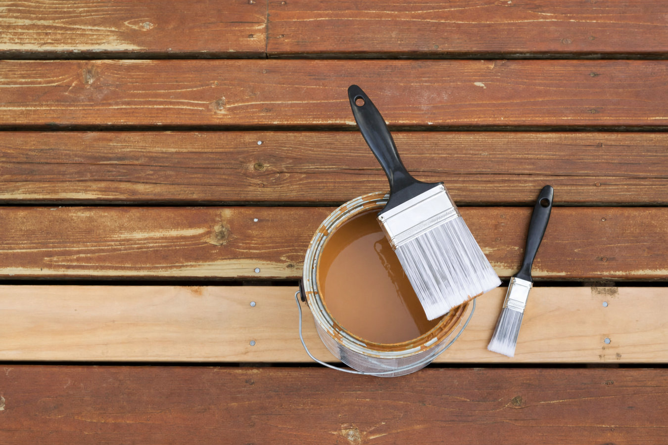 Deck staining and sealing